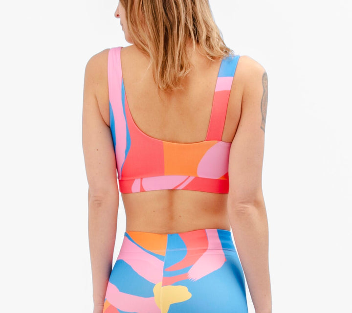 Top Bloom Blue · Entrena y nada